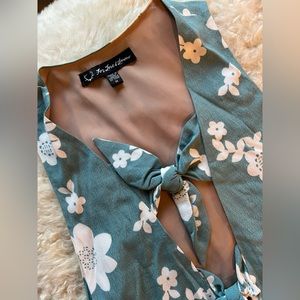 For Love and Lemons silky tank dress with floral design and cutouts.